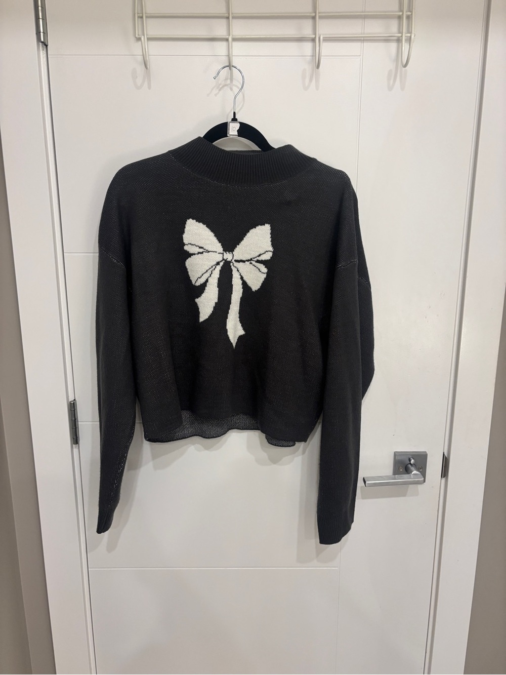 Urban Heritage Black Crewneck Sweater with White Bow Motif